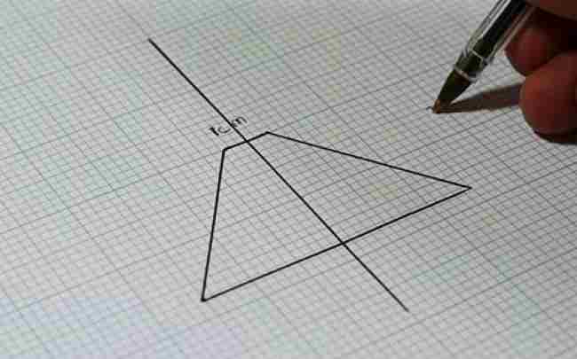 Sketch out a basic trapezoid shape on the graph paper using the dimensions 1xm x 3.5cm x 6cm